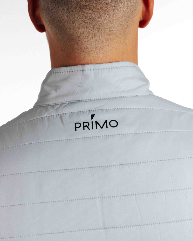 The Primo Golf Light Gray Vest back logo