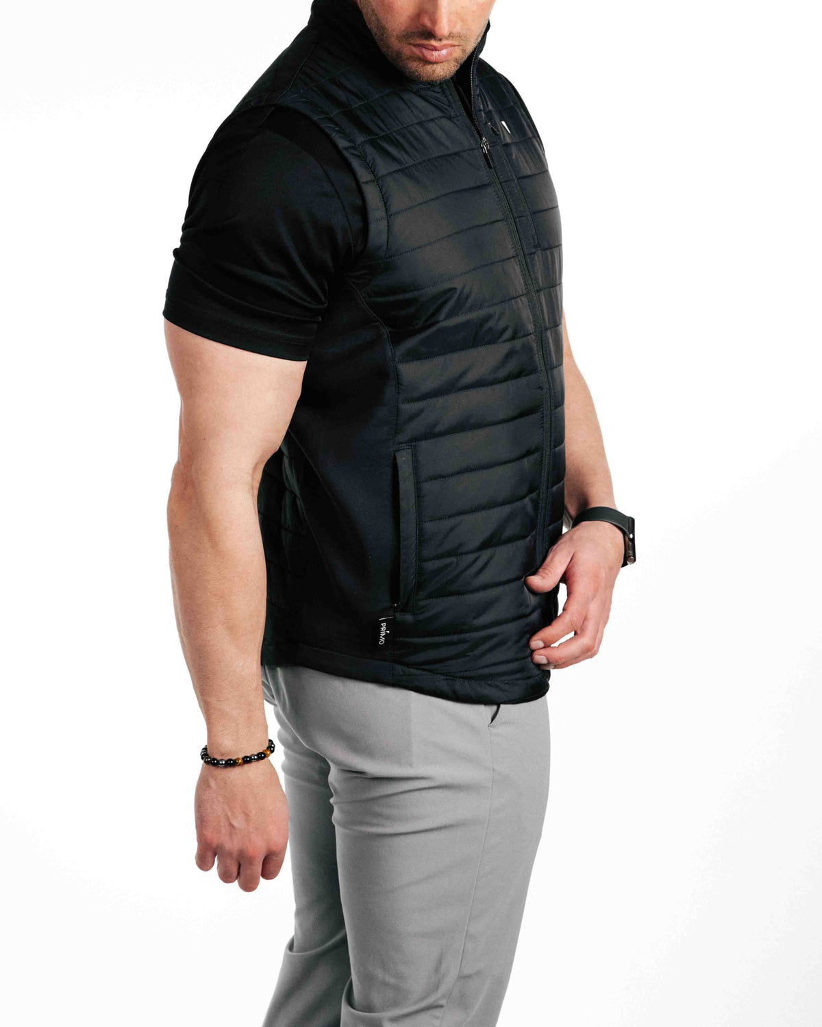 The Primo Golf Black Vest side panel