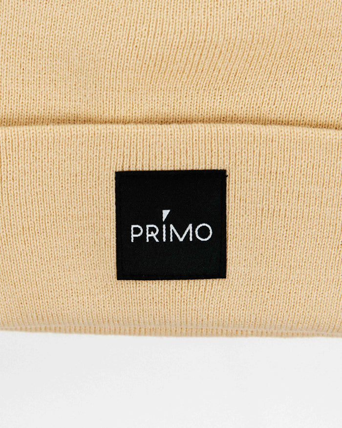 Close up of primo logo on square fabric patch