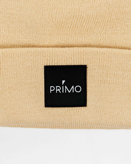 Close up of primo logo on square fabric patch