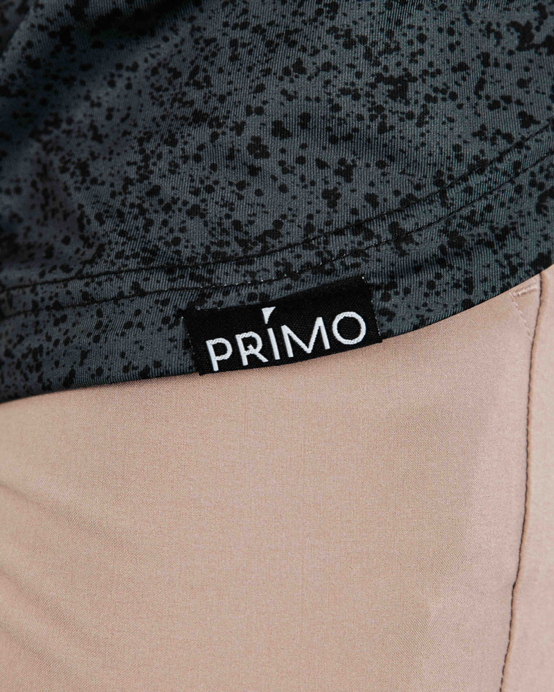 Midnight Classic Collar Polo Primo wordmark tag on hem