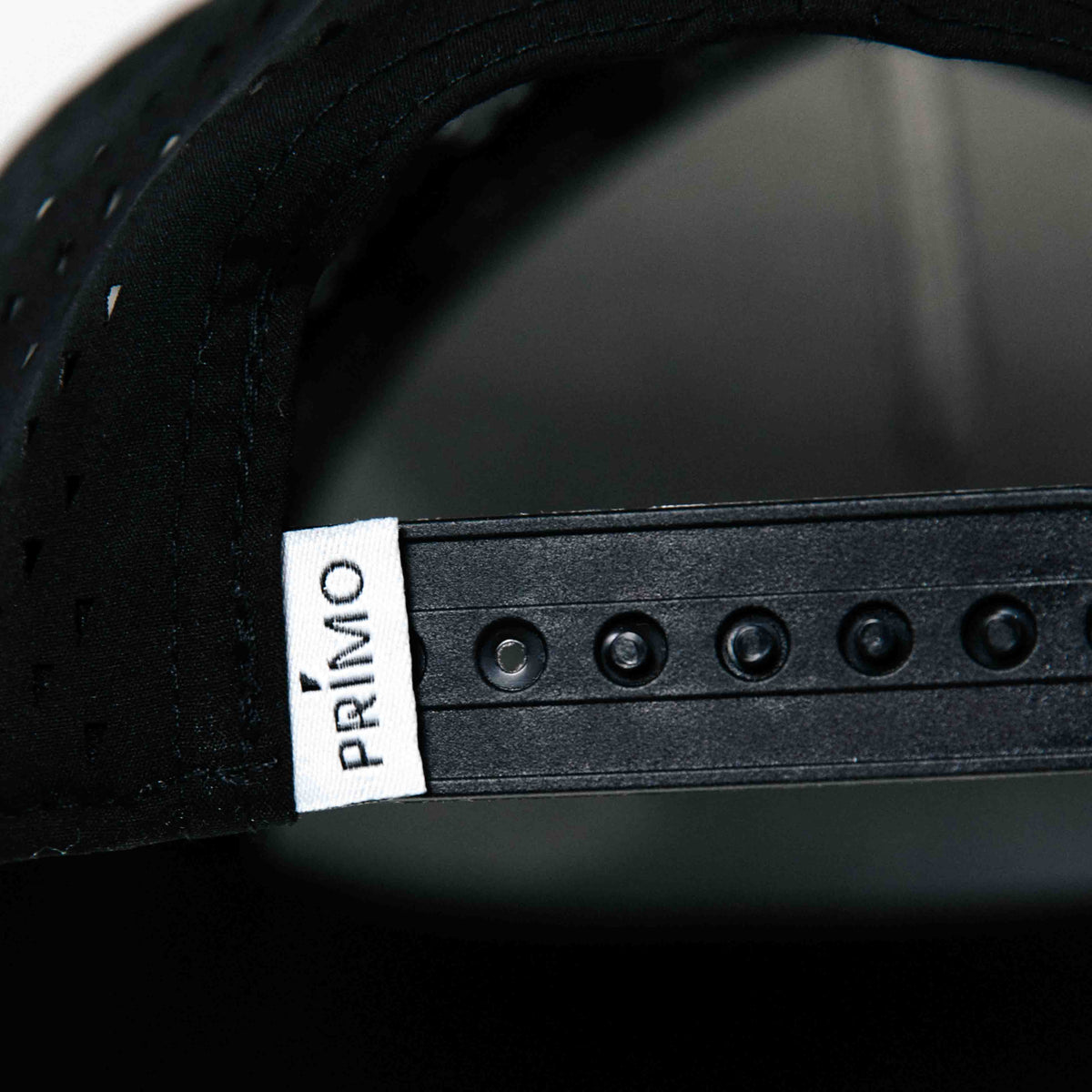 Primo GOLF hat Snap back tag