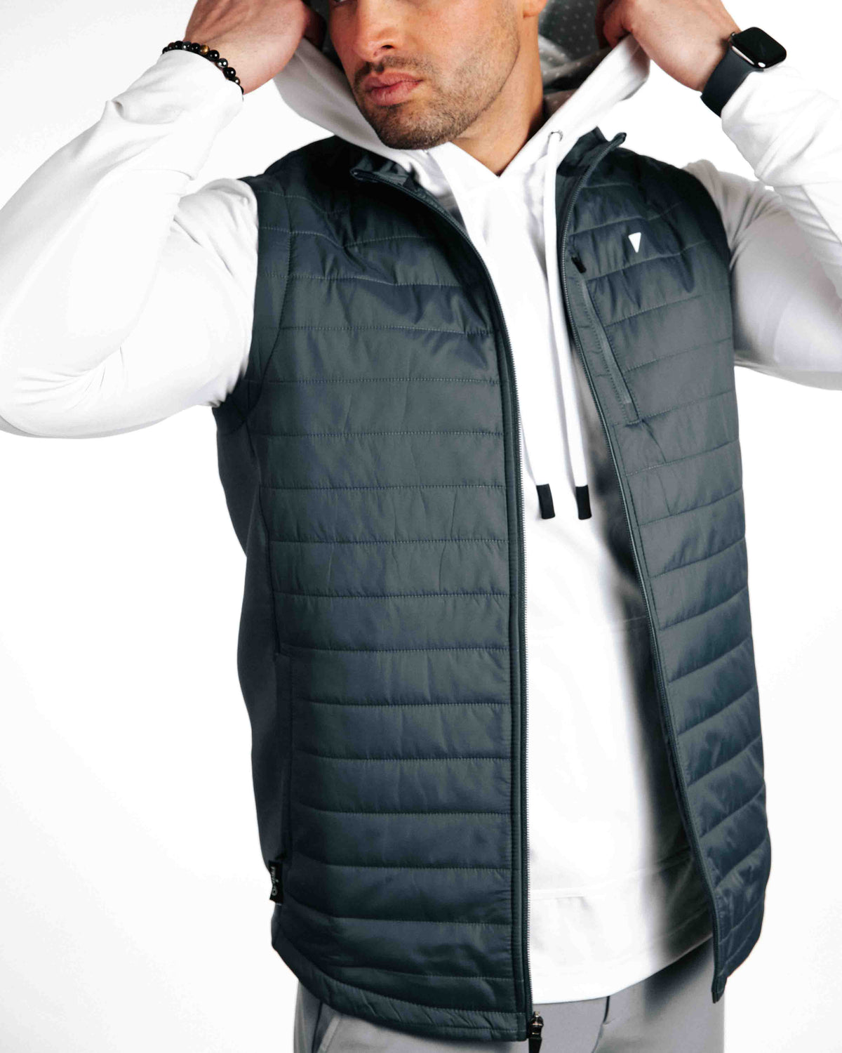 The Primo Golf Dark Gray Vest open with hoodie