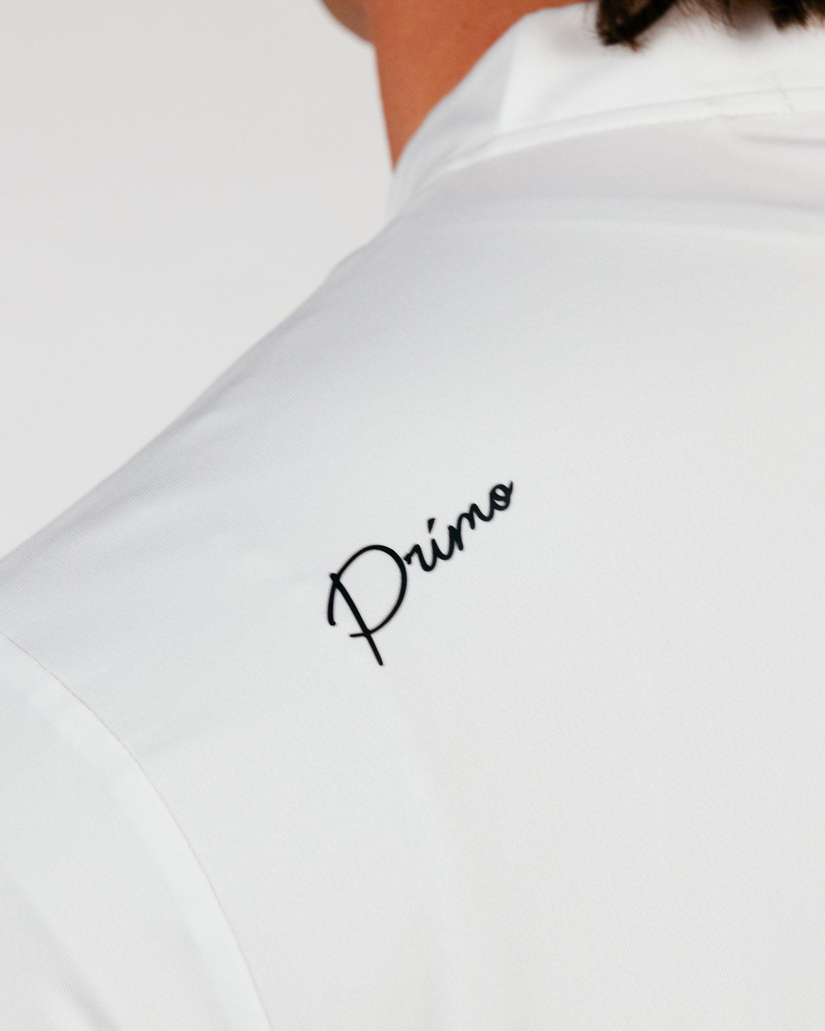 White Cursive Blade Polo β Primo Golf Apparel