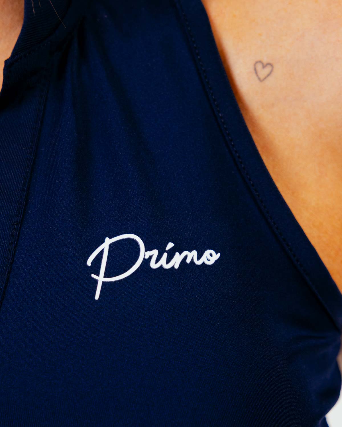 Women's Navy Cursive Sleeveless Polo β Primo Golf Apparel